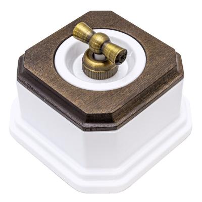 Ретро выключатель Salvador, пластик, наружный монтаж, поворот., фигурная рамка дуб коричневый, белый