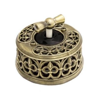 Ретро выключатель Salvador, фарфор, наруж.монтаж, поворотный, черный с накладкой светлая латунь Ретро выключатель Salvador, фарфор, наруж.монтаж, поворотный, черный с накладкой светлая латунь